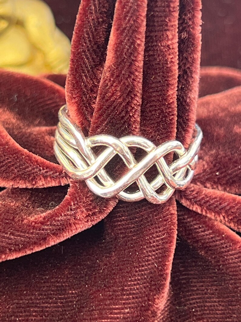 Anillo rompecabezas pesado de 4 piezas en plata de ley imagen 2