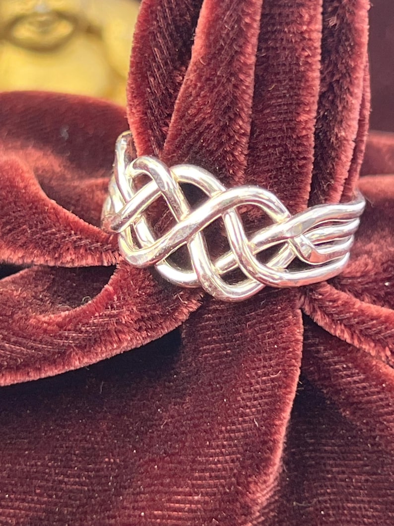 Anillo rompecabezas pesado de 4 piezas en plata de ley imagen 1