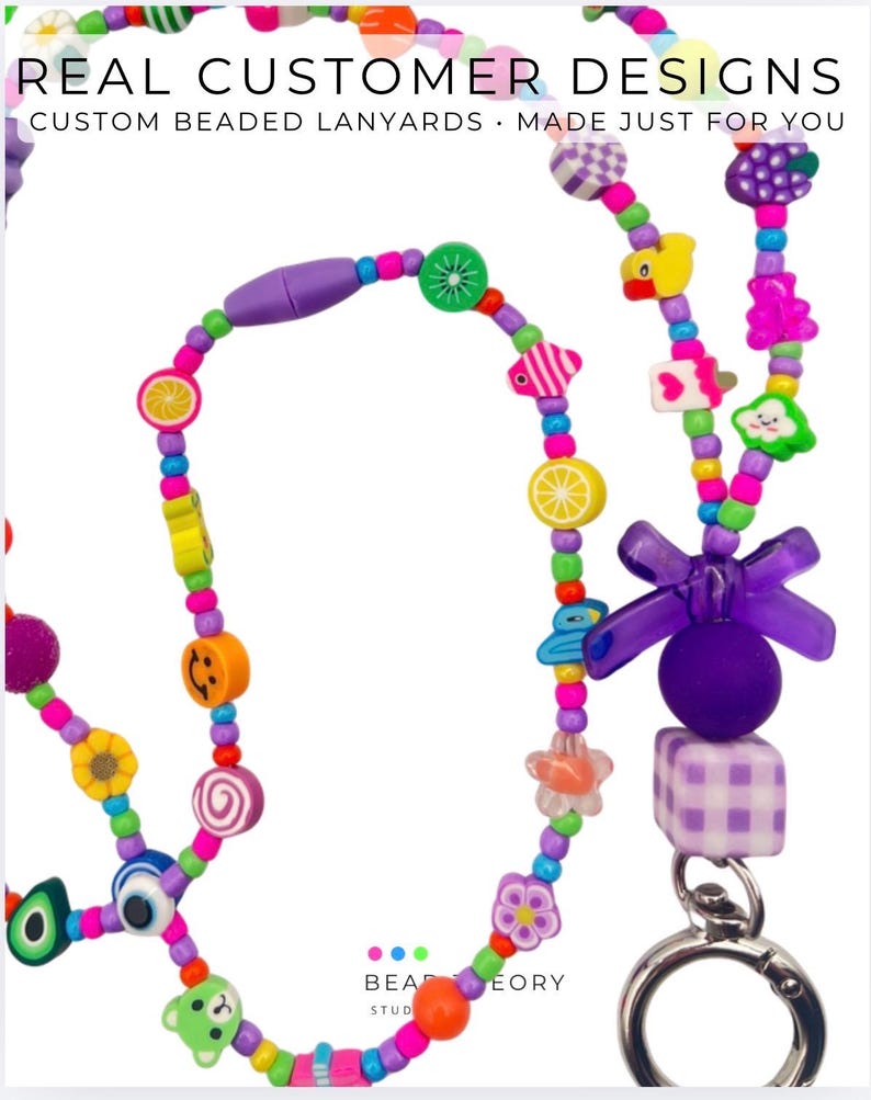 May include: A beaded lanyard featuring colorful plastic beads in various shapes including fruits, animals, flowers, and smiley faces. The text REAL CUSTOMER DESIGNS CUSTOM BEADED LANYARDS MADE JUST FOR YOU is visible at the top. A purple bow and metal clasp are attached.