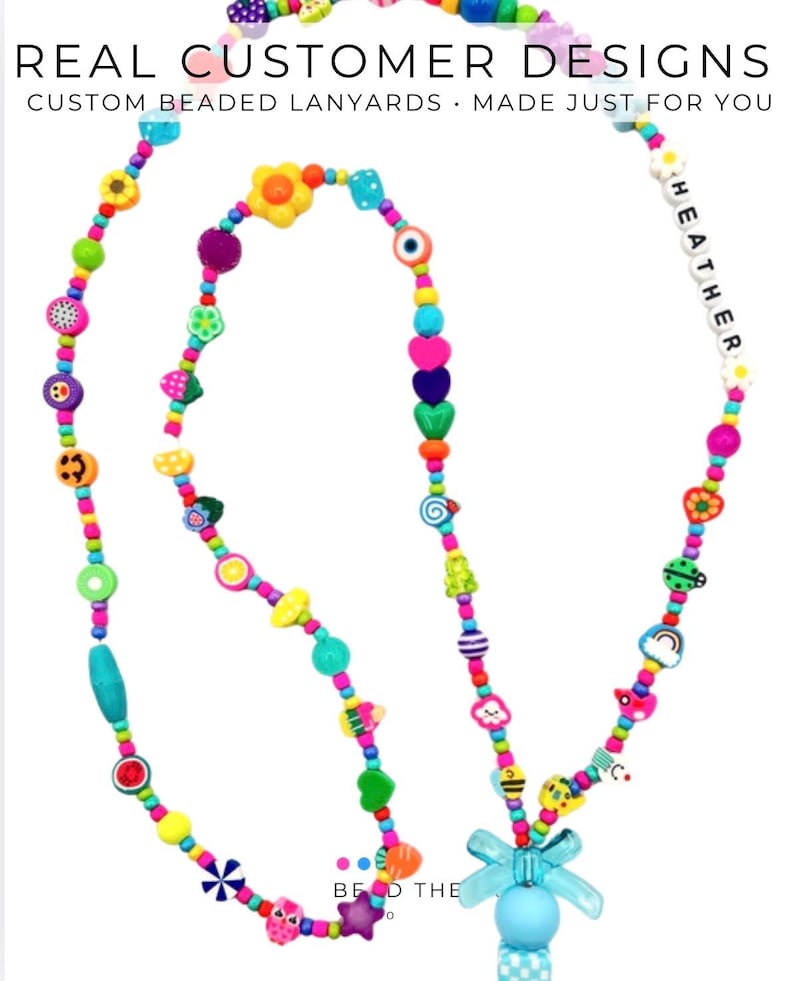 May include: A multi-colored beaded lanyard featuring various shapes including flowers, hearts, fruits, and smiley faces. The text "REAL CUSTOMER DESIGNS CUSTOM BEADED LANYARDS MADE JUST FOR YOU" is visible at the top, and the name "HEATHER" is spelled out in white letter beads.