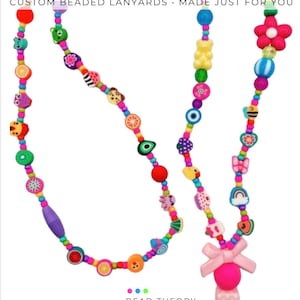 May include: A colorful beaded lanyard featuring various shaped charms including fruits, animals, flowers, and a pink bow. The text REAL CUSTOMER DESIGNS CUSTOM BEADED LANYARDS MADE JUST FOR YOU and BEAD THEORY STUDIO is visible at the top and bottom.