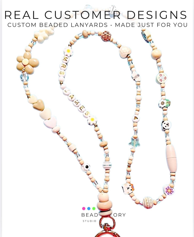 May include: A custom beaded lanyard featuring a variety of light-colored wooden, plastic, and metallic beads in shapes including flowers, hearts, stars, and a panda face. The beads spell out MRS JAMES and include a metal lobster clasp at the bottom.