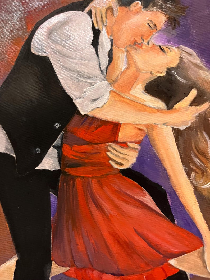 May include: An oil painting depicts a romantic scene of a couple embracing and kissing. The man wears a white shirt, black vest, and pants. The woman is in a red dress. The background is a mix of purple and orange hues.