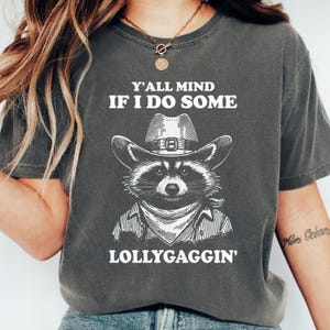 Y&#39;all Mind If I Do Some Lollygagging Shirt, Funny Cowboy Raccoon Shirt, Lollygagging Tee, Vintage Funny Raccoon T-Shirt, Funny Meme Tee
