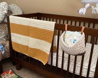 Baby boho blanket with crib basket.