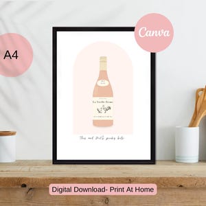 Könnte beinhalten: Gerahmter Druck mit einer Roséweinflasche, beschriftet mit "La Vieille Ferme", in minimalistischem Design. Der Druck verwendet Rosa- und Beigetöne. Der Text "This and that's picky bits" befindet sich unten. Der Rahmen ist schwarz.