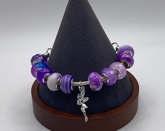 Charm Bracelet with Decorative Beads and Silver Fairy Charm  Purple