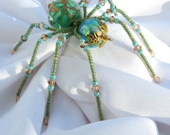 Christmas Spider Ornament in Teal and Gold Folk Art Tale of Tinsel and Garland