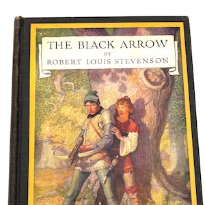 May include: A hardcover book titled "THE BLACK ARROW" by Robert Louis Stevenson. The cover features an illustration of two young men in medieval attire, one holding a crossbow, set against a forest backdrop. The book has a black spine and a yellow border.