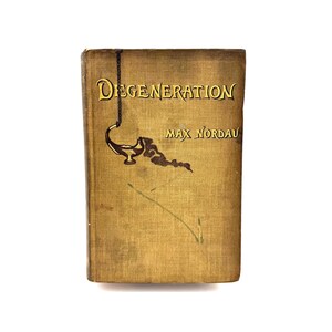 May include: A hardcover book titled Degeneration by Max Nordau with a tan, textured fabric cover. The front cover features a dark brown illustration of a hanging oil lamp with smoke and yellow lettering for the title and author name.