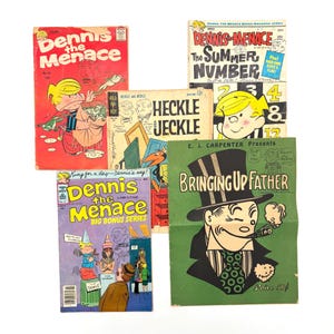 May include: A collection of vintage comic books featuring the characters Dennis the Menace, Heckle and Jeckle, and Bringing Up Father. The comics have colorful covers with illustrations and text, including the price.