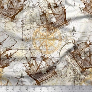 May include: Fabric with a vintage nautical map design. The fabric features brown sailing ships and compass roses over a cream-colored background. The design includes a ruler with inches and centimeters.