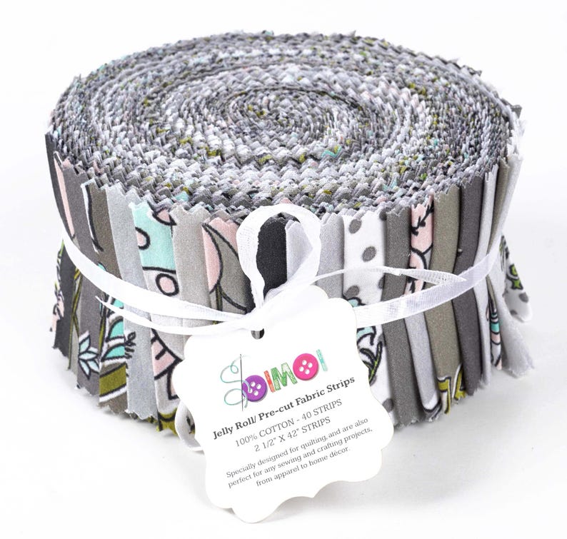 May include: A roll of pre-cut fabric strips in a variety of gray, white, and green floral patterns. The roll is tied with a white ribbon and has a label that reads "Jelly Roll/ Pre-cut Fabric Strips 100% COTTON - 40 STRIPS 2 1/2" X 42" STRIPS  Specially designed for quilting, and are also perfect for any sewing and crafting projects, from apparel to home decor."