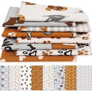 Peut inclure: Une pile de carrés de tissu à motifs sur le thème des chiens. Les tissus présentent divers motifs, notamment des visages de chiens, des os, des empreintes de pattes et des silhouettes de chiens dans des tons de marron, de gris et de blanc. Les tissus sont empilés.
