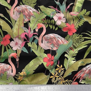 May include: A fabric with a tropical design featuring pink flamingos, red and pink hibiscus flowers, and green leaves on a black background. The pattern includes a ruler with inches and centimeters.