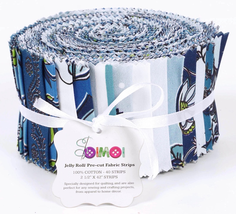 May include: A roll of pre-cut fabric strips in blue and white patterns. The fabric is 100% cotton and comes in 40 strips, each measuring 2 1/2 inches by 42 inches. The label reads "Jelly Roll/ Pre-cut Fabric Strips".
