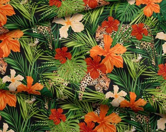 May include: Fabric with a tropical jungle design. The pattern features orange and red hibiscus flowers, green palm leaves, and leopard print spots on a black background. The ruler at the bottom measures up to 13 inches.