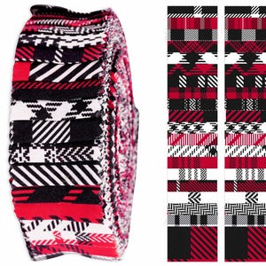 May include: A roll of red, black and white fabric with various plaid patterns. The fabric is pre-cut into 2.5 inch squares.