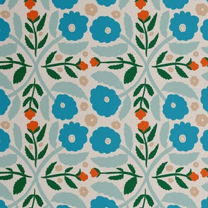 May include: A repeating floral pattern featuring stylized blue flowers with white centers, orange buds, and green leaves on a light cream background. The design includes light blue curved lines and small tan flower accents, creating a symmetrical, decorative motif.