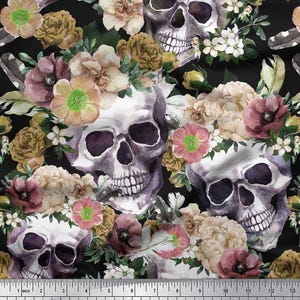 May include: A repeating pattern featuring watercolor skulls adorned with flowers in shades of pink, cream, and yellow against a black background. The design includes a ruler with inch and centimeter measurements.