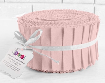 May include: A roll of pink pre-cut fabric strips for quilting and crafting projects. The roll is labeled "Jelly Roll Pre-cut Fabric Strips" and includes 40 strips that are 2.5 inches by 42 inches.