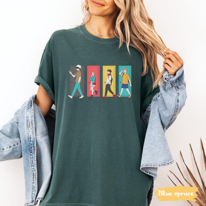 May include: A teal-colored t-shirt featuring a graphic of four anime-style characters walking through colorful doors. The doors are in shades of gray, red, yellow, and blue. The text "Blue spruce" is in the bottom right corner.