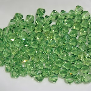 24 Peridot Swarovski Crystals, 4mm Bicone Beads, Jewelry Making