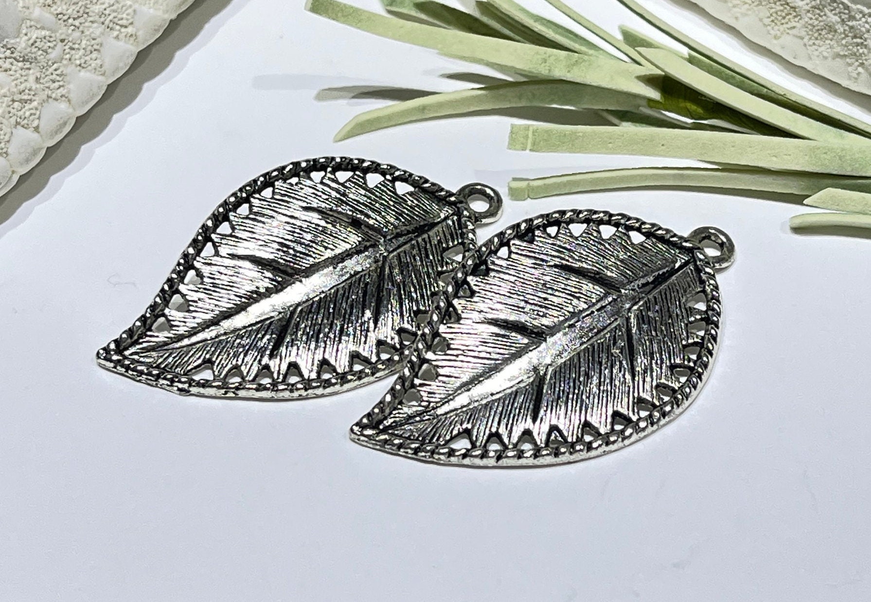 2 pcs Silver Tone Real Leaf Charms Necklace Pendant Jewelry Findings 80x41x1mm 2 pcs Silver Tone Real Leaf Charms Necklace Pendant Jewelry Findings 80x41x1mm