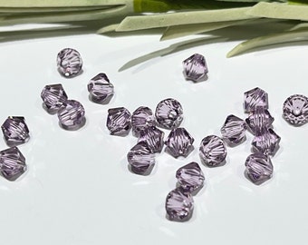 12 Light Amethyst Swarovski Crystal Beads: 4mm Bicone Xilion 5328