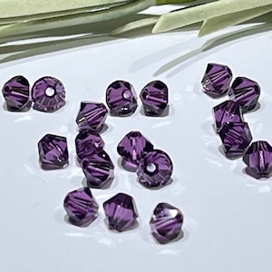 12 Amethyst Swarovski Crystal Beads: 4mm Xilion Bicone