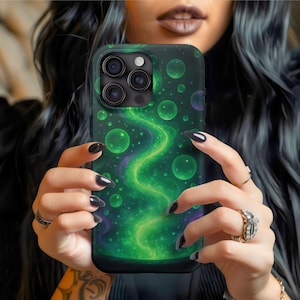 May include: Green and black phone case featuring a swirling, glowing green design with bubbles. The case has a dark green background with a vibrant, abstract pattern. The phone case is designed to fit a smartphone.