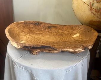 Hand carved cherry live edge wooden serving bowl with dark sea green epoxy inlay.