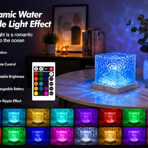 May include: A square-shaped LED lamp with a textured, translucent surface that projects a water ripple light effect. The lamp features a white base with a power button and comes with a remote control offering 16 color options, adjustable brightness, and a rechargeable battery.
