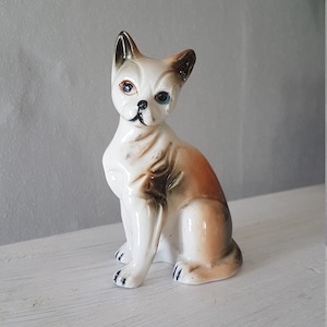 Vintage little porcelain / ceramic / dog / 3 3/4&quot; x 2 1/4&quot;  figurine / pottery