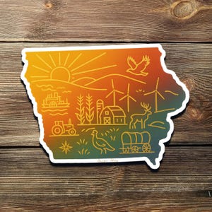 May include: A sticker in the shape of Iowa, featuring a sunset, farmland, and wildlife. The design includes a tractor, windmill, deer, and a covered wagon, all in a gradient of orange, yellow, and green.
