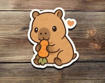 Sticker Chibi capybara – vinylsticker met schattige dieren en wortel | Kawaii capibara cadeau voor laptop, hydroflask, dagboek