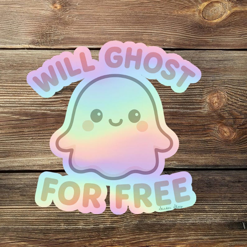 May include: A holographic sticker featuring a cute ghost with the text "WILL GHOST FOR FREE". The ghost is pastel-colored with a smiling face. The sticker is on a wooden background.