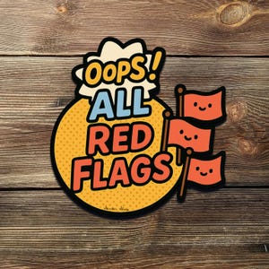 May include: A sticker with the text "OOPS! ALL RED FLAGS" in a comic book style. The design includes a yellow circle with a dotted pattern, a speech bubble, and three red flags with smiling faces. The background is a wood grain.