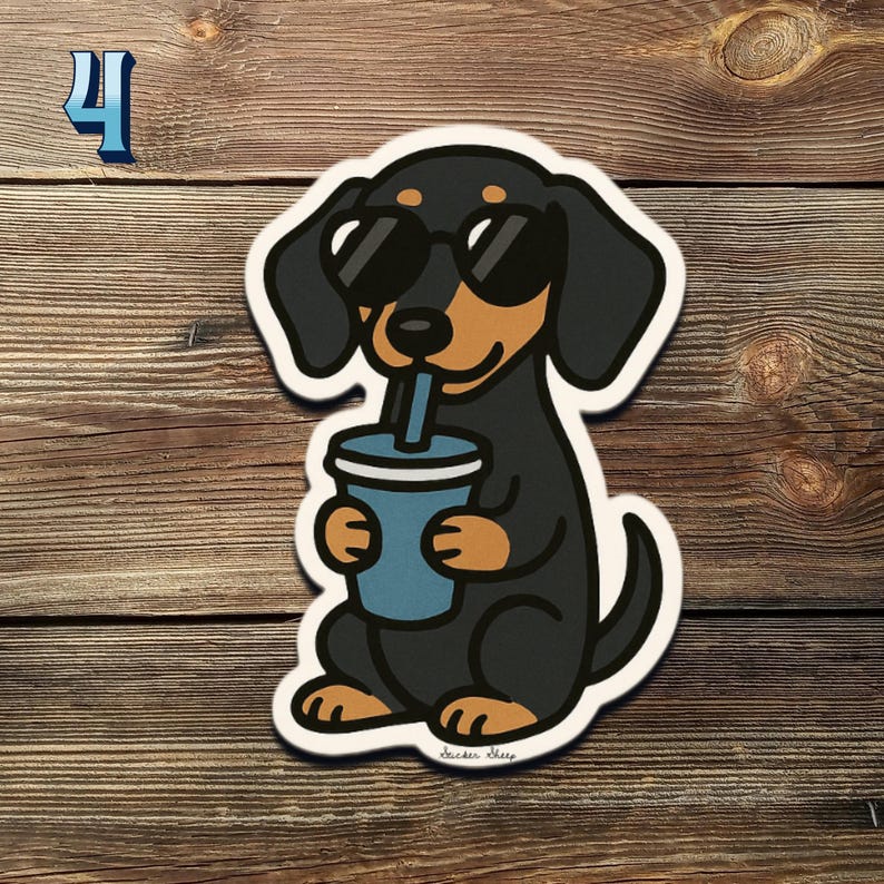 May include: A sticker of a cartoon dachshund wearing sunglasses, drinking from a blue cup. The dog is black and brown with a white outline. The number 4 is in the upper left corner.