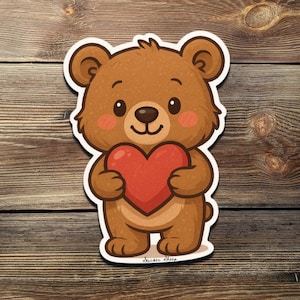 Ours mignon tenant un autocollant coeur - Sticker en vinyle Kawaii Love Bear, un cadeau adorable pour la Saint-Valentin, un anniversaire ou une surprise romantique