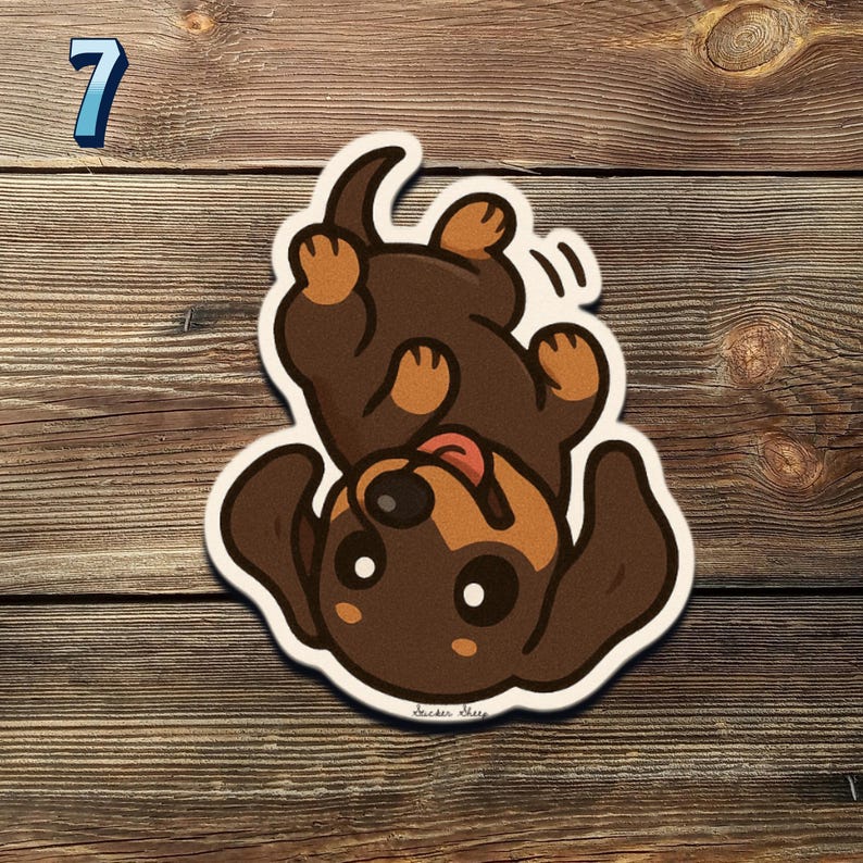 May include: A sticker of a cartoon dachshund dog, brown and tan, lying upside down with its tongue out. The sticker has a white outline. The number 7 is in the top left corner.