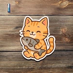 May include: A sticker featuring a cartoon orange tabby cat with black stripes, holding a gray fish. The cat has a smiling face and is sitting down. The number "1" is in the upper left corner.