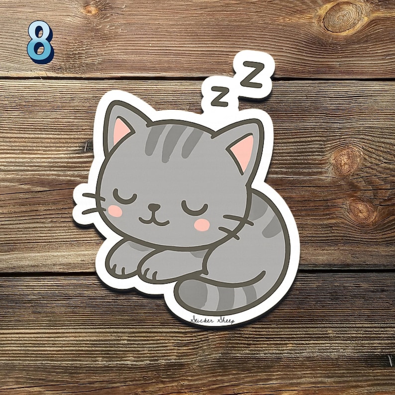 May include: A gray cartoon cat sticker with closed eyes and pink inner ears, sleeping with 'Zz' above its head. The sticker has a white border and the text 'Sticker Sheep' at the bottom. A blue number 8 is in the top left corner.