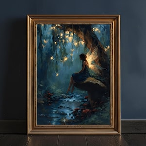 May include: A framed wall art print depicting a figure with glowing wings sitting on a large mushroom in a dark forest. The scene features a blue stream, red mushrooms, and hanging golden lights suspended from tree branches in a misty setting.