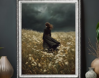 Sfeervolle kunstprint van een bloemenveld, meisje dat de storm trotseert, donker, cottagecore-gotisch landschap