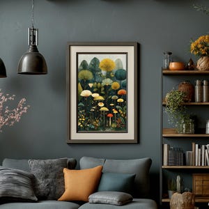 May include: A framed art print depicting a fantastical forest with vibrant mushrooms and stylized trees in yellow, orange, and green hues. The artwork is displayed in a living room with a grey sofa and decorative elements.