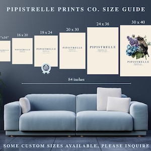 May include: A size guide for art prints from Pipistrelle Prints Co. Various sizes are displayed, including 12"x16", 16x20, 18x24, 20x30, 24x36, and 30x40 inches. The prints are displayed above a blue sofa, with the text "SOME CUSTOM SIZES AVAILABLE, PLEASE INQUIRE".
