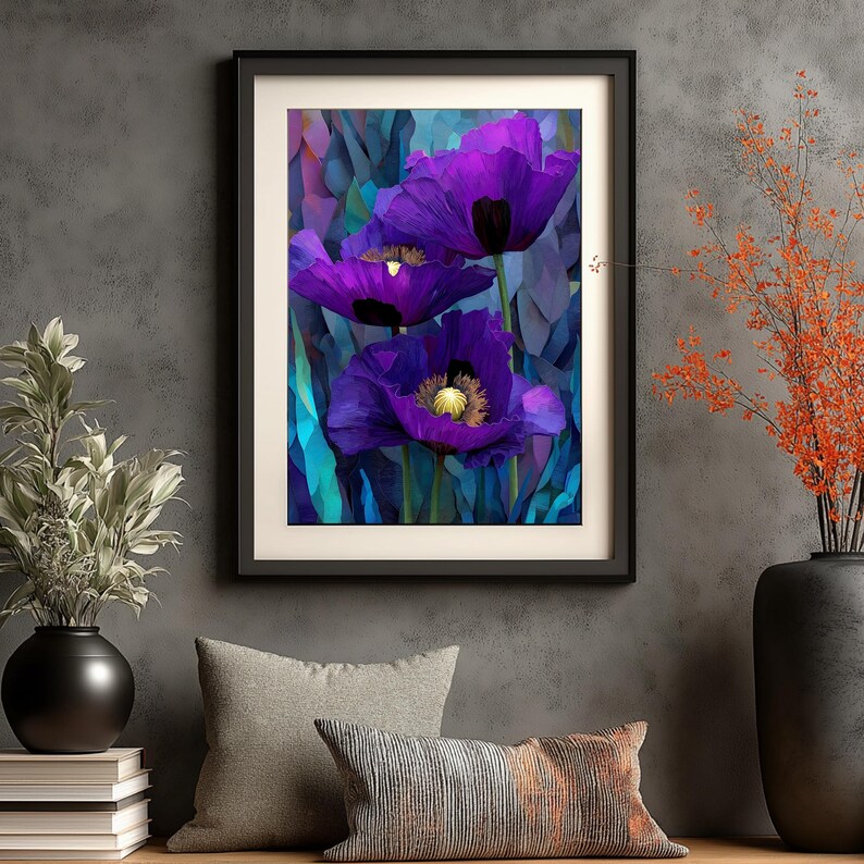 May include: Framed art print featuring a close-up of three vibrant purple poppy flowers with yellow centers. The artwork is set against a backdrop of blue and teal geometric shapes, framed in a black border. The print is displayed on a gray wall.