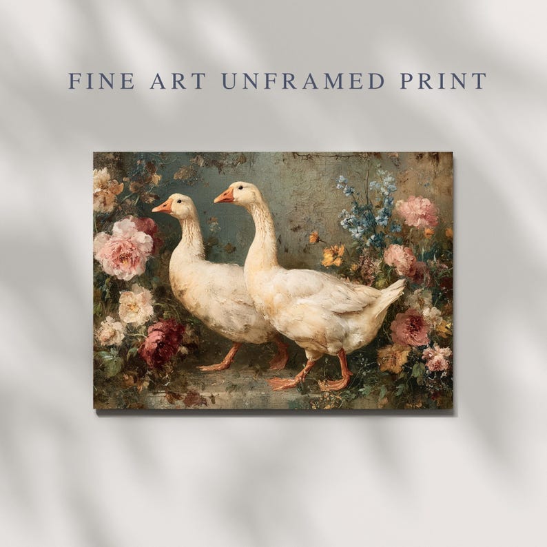 May include: Fine art print featuring two white geese with orange beaks and feet, set against a backdrop of colorful flowers. The artwork has a vintage aesthetic, with the text "FINE ART UNFRAMED PRINT" at the top.