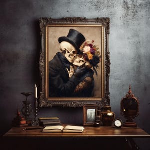 May include: A framed painting depicts two skeletons embracing, one wearing a top hat and the other adorned with flowers. The artwork is set against a dark, textured wall, with a wooden table in the foreground holding various decorative items.